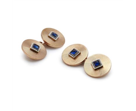 A pair of French sapphire set and enamelled cufflinks, Cartier each with ribbed circular terminal collet set to the centre wi