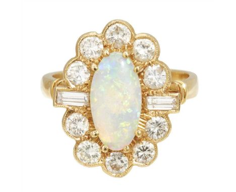 A opal and diamond set cluster ring claw set with an oval opal cabochon including diamond surround, to a plain shank, with Br