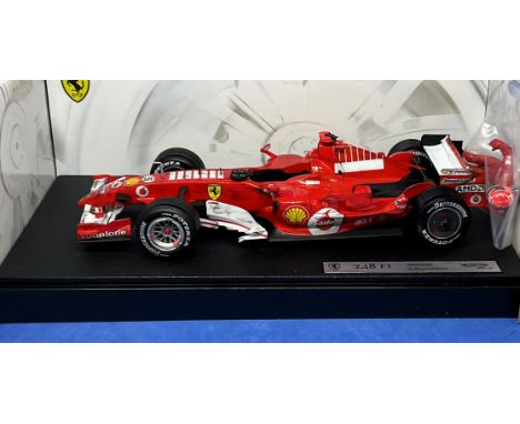 Hot Wheels Racing 2006 Ferrari 248 F1 Michael Schumacher 1:18 scale model. Scuff marks on model in original box. Good conditi
