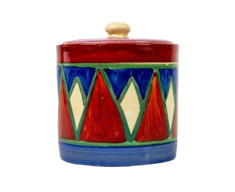 A Clarice Cliff Original Bizarre preserve pot and later cover. Bizarre Newport Pottery marks, height 9cm.There is no restorat