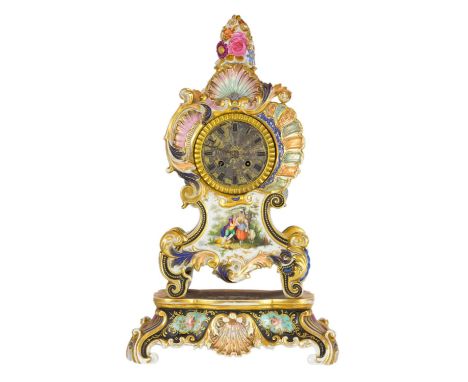 A Paris porcelain mantel clock, 19th century. On stand, height 50cm, width 28.5cm.There is a loss to a finial on the back of 