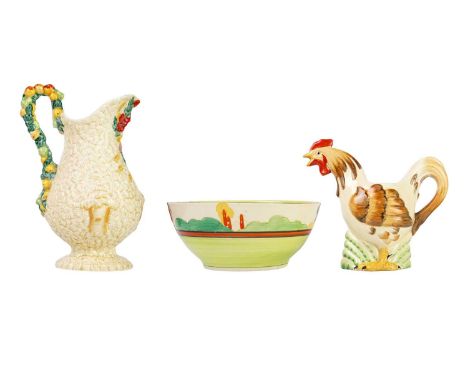A Clarice Cliff novelty cockerel teapot. Newport Pottery marks, together with a Celtic Harvest jug and a Havre 8.1/2 size bow