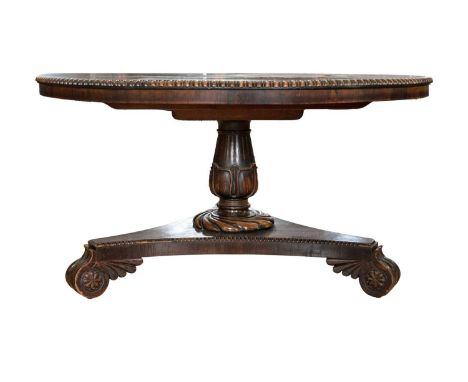 A Regency rosewood centre table. Stamped 'P &amp; R Williamson upholsterers &amp; r, Inverness, height 73cm, diameter 135cm.