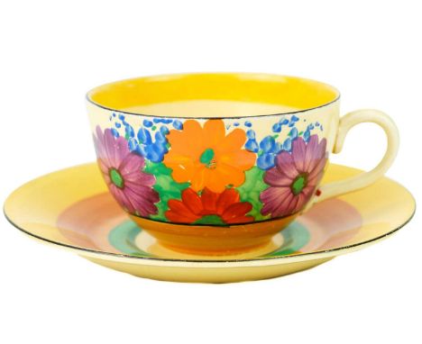 A Clarice Cliff Gay Day pattern tea cup and saucer. The tea cup with Bizarre Wilkinson Ltd marks the saucer with Bizarre Newp