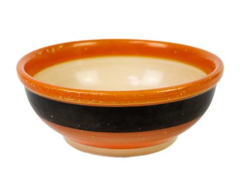 A Clarice Cliff Banded shallow bowl with a heavy rim. The base with black overpaint with a patch revealing Bizarre Newport Po