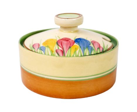 A Clarice Cliff Crocus pattern Bon Jour shape shallow pot and cover. Wilkinson Ltd marks, diameter 10cm.