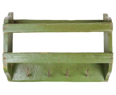 A George III naive green painted wood hanging shelf. With four iron hooks, height 33.5cm, width 48.5cm, depth 15cm.
