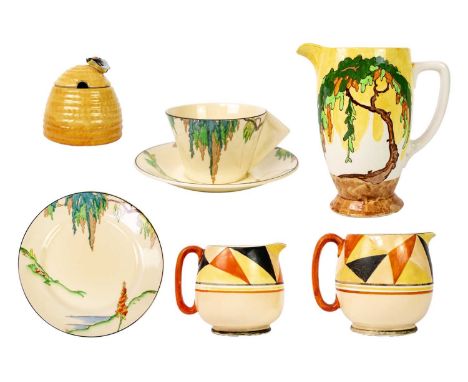 A Newport Pottery Burslem bee hive honey pot. Height 7cm, together with two Scotch Ivory jugs, a Royal Staffordshire Sunny-Br