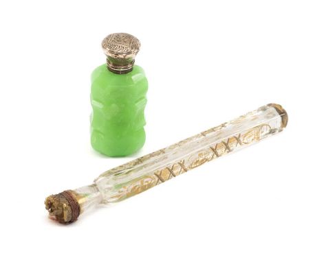 TWO ANTIQUE GLASS PERFUME BOTTLES, comprising Victorian green opaque bottle with hinged silver lid, 8cms high, and continenta