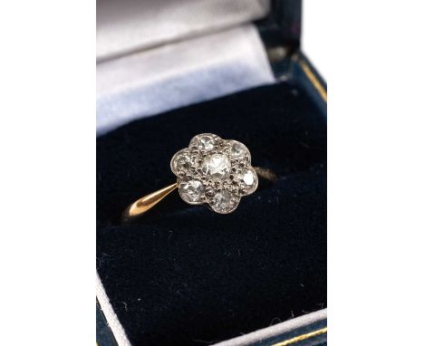 18CT GOLD DIAMOND SEVEN STONE CLUSTER RING, the seven stones totalling 0.4-5cts overall approx., ring size N, 3.8gms, in Heir