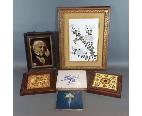 A Japanese porcelain tile depicting butterflies amongst foliage together with five other tiles 