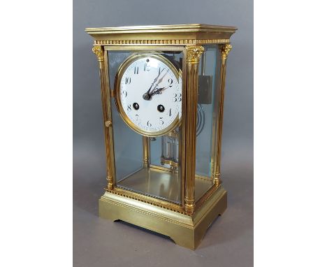 A late 19th Century French library clock, the enamel dial with Arabic numerals, 26.5cms tall 
