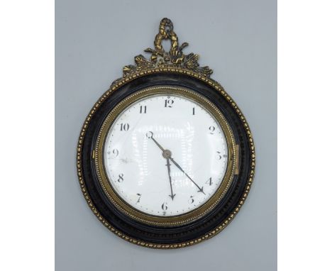 A 19th Century circular small wall clock, the enamel dial with Roman numerals, the pocket watch movement by Charles Hope, Lon