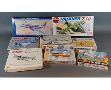 An Airfix model Harrier T-10 together with three Airfix models and four other model kits 