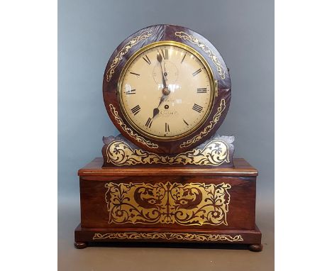 A Regency rosewood and brass inlaid bracket clock, the circular dial inscribed Webster, London, with single fusee movement, c