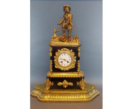 A 19th Century French Ormolu mantle clock, mounted with a figure in the form of a Cavalier, the enamel dial with Roman numera