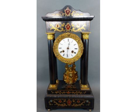 A 19th Century French ebonised and brass mounted Portico clock, the circular enamel dial with Roman numerals and two train mo
