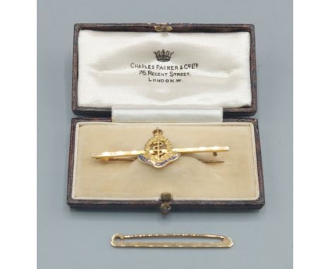 A 9ct gold and enamel Medical Army Corps bar brooch together with a 9ct gold tie pin, 4.8gms 