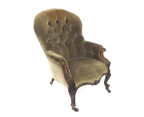 Victorian button back upholstered chair upon castors (a.f.)