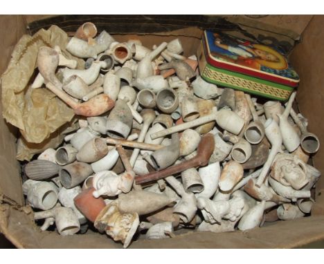 A large collection of vintage clay pipe bowls, a dressing glass, various metalware and miscellaneous items.