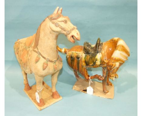 Two Tang-style earthenware horses, one unglazed with enamel decoration, (2).