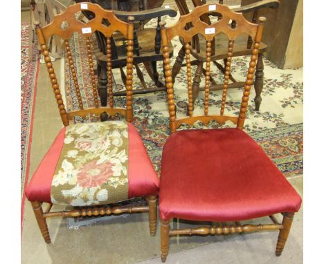 A pair of 19th century fruit wood bobbin-turned nursing chairs, with open backs and upholstered seats, (2).