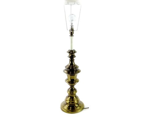 A 20thC brass table lamp, on turned stem with circular foot, with electrical feature, 83cm high.