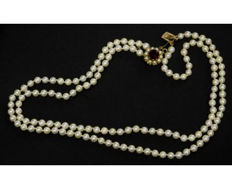 A two row cultured pearl necklace, one row with 70 pearls 5.5mm x 4.7mm, the other with 73 pearls 5.5mm x 4.9mm, with a circu