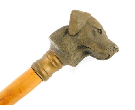 A 20thC walking stick, with metal dog head handle, 106cm high.