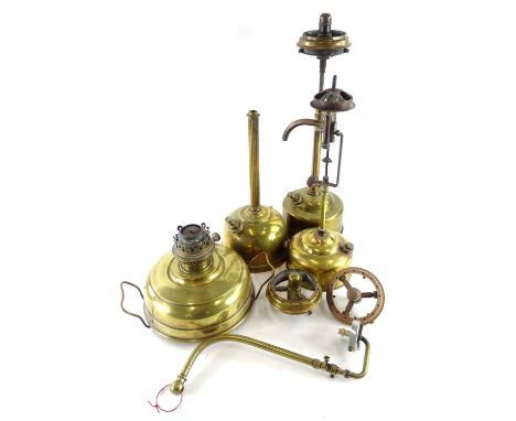 Various paraffin lamps, to include American examples, an oil lamp, etc.