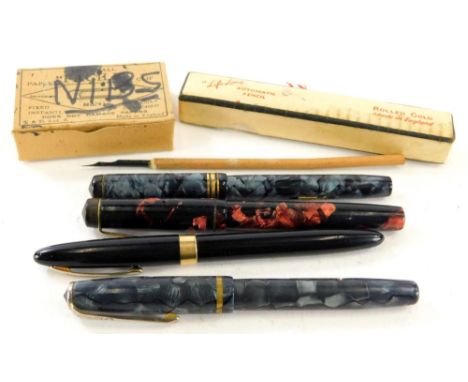 A Sheaffer's fountain pen in black with gilt and chrome trim, 13cm wide, a Summit, red and black marble pen, Conway Stewart, 
