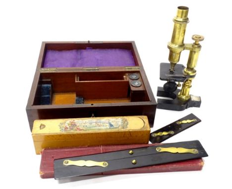 A late 19thC brass and ebonised iron microscope, bearing white metal plaque for William Weir, University of Edinburgh, botany