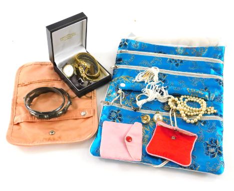 A quantity of modern costume jewellery and effects, to include two silver bangles, faux pearl necklace, clip on earrings, sil