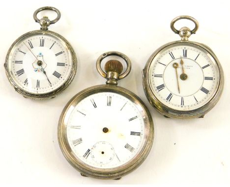 Three silver fob and pocket watches, comprising a fob watch with white enamel dial, and painted floral decoration to centre, 