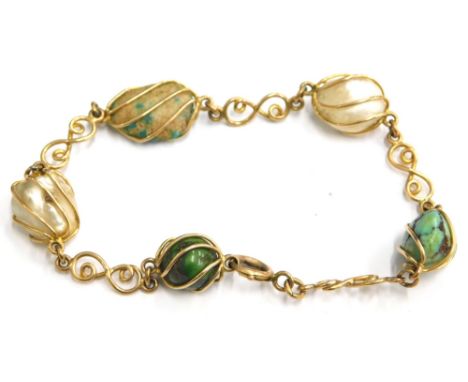 A 9ct gold multi stone set bracelet, with various semi precious and other stones in cage links, including turquoise and pearl