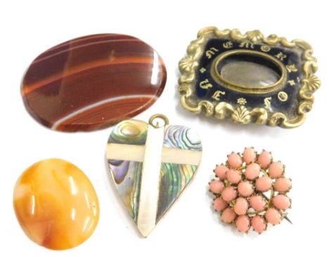 A small quantity of jewellery, comprising a large oval red/orange agate piece, a cabochon type orange agate, a mother of pear