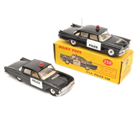 2 Dinky Toys American Police Cars. USA Police Car (Dodge Royal Sedan) (258).Boxed. Plus a loose Ford Fairlane (258). Both in 