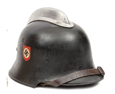 A Third Reich fireman’s double decal helmet issued to Police,  the smooth black painted skull with aluminium comb, two sets o