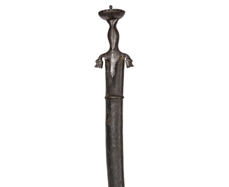 An 18th century Indian sword, Pulouar,  flat SE blade 30”, the steel hilt with down turned quillons terminating in zoomorphic