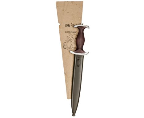 A scarce Third Reich NPEA Student’s dagger, by Eickhorn, the blade etched “Mehr Sein als Scheinen”, the hilt with plain brown