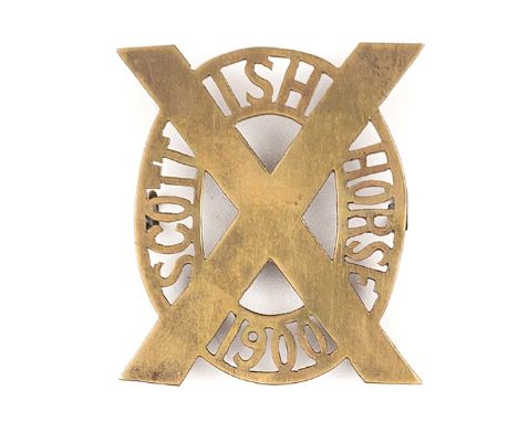 A Boer War period sheet brass glengarry badge of the Scottish Horse, wire loops. GC Plate 2