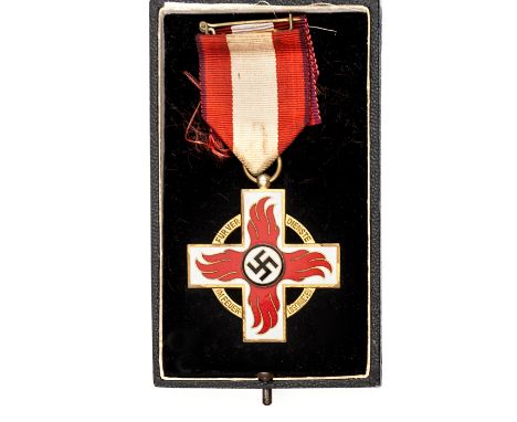 A scarce Third Reich fire brigade decoration, first class,  in gilt and enamel, with spare piece of ribbon, in its presentati