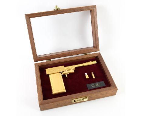James Bond The Man With The Golden Gun - A replica golden gun, 24 karat gold-plated replica manufactured by S.D. Studios Ltd.