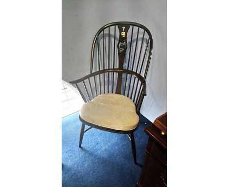 An Ercol stick back Windsor chair