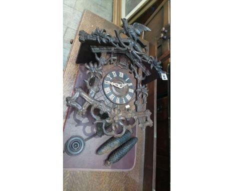 A carved cuckoo clock