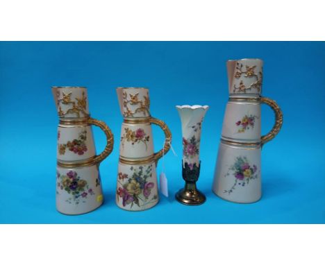 Pair of Royal Worcester blush ivory jugs decorated with flowers, a larger jug with similar decoration and a bud vase