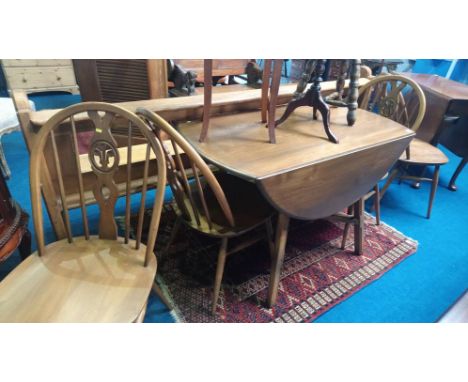 Ercol drop leaf table and four hoop back Windsor chairs