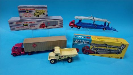 Dinky toys; a Euccid rear dump truck, 965, a tractor trailer Mclean, 948 and a Corgi Carrimore car transporter, 1101 (3)