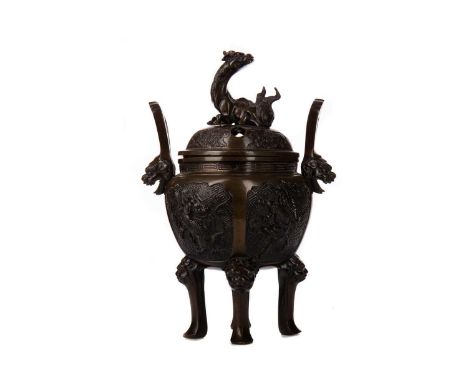 LATE 19TH/EARLY 20TH JAPANESE BRONZE KORO AND COVER,the pierced cover with cast qilin finial, the body with four qilin in rel