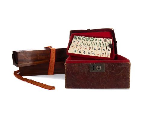 EARLY 20TH CENTURY CHINESE MAHJONG SET,with bone and bamboo tiles, housed in original embossed and stitched leather case, alo